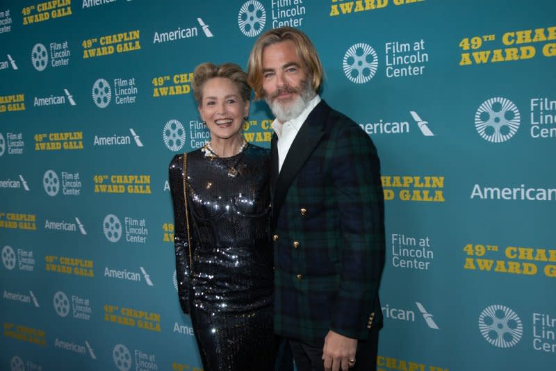 Sharon Stone (L) and Chris Pine attend the Chaplin Award gala honoring Jeff Bridges on Monday. Photo by Serena Xu Ning/UPI