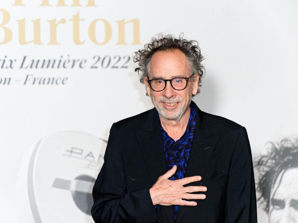 Tim Burton wears suit while attending he Lumiere Award ceremony during the 14th Film Festival Lumiere in October 2022.