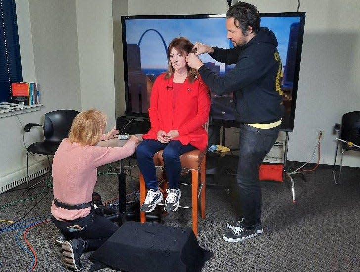 Cecilia Williams of Bonne Terre, Missouri prepares for a television interview to talk about Bentley's Law, legislation that would require drunk drivers to pay restitution to the children of parents killed in drunk-driving crashes.