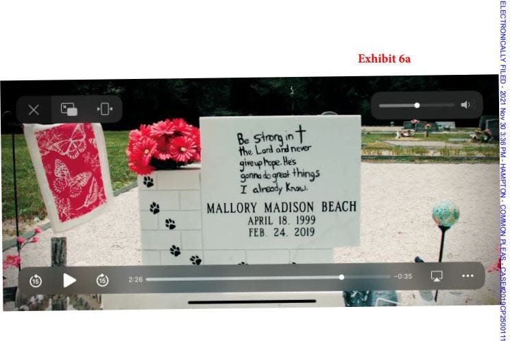 Lawsuit exhibit shows Mallory Beach memorial marker.