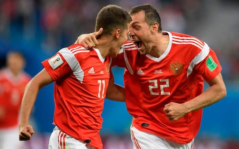 Artem Dzyuba celebrates his goal - Credit: AFP