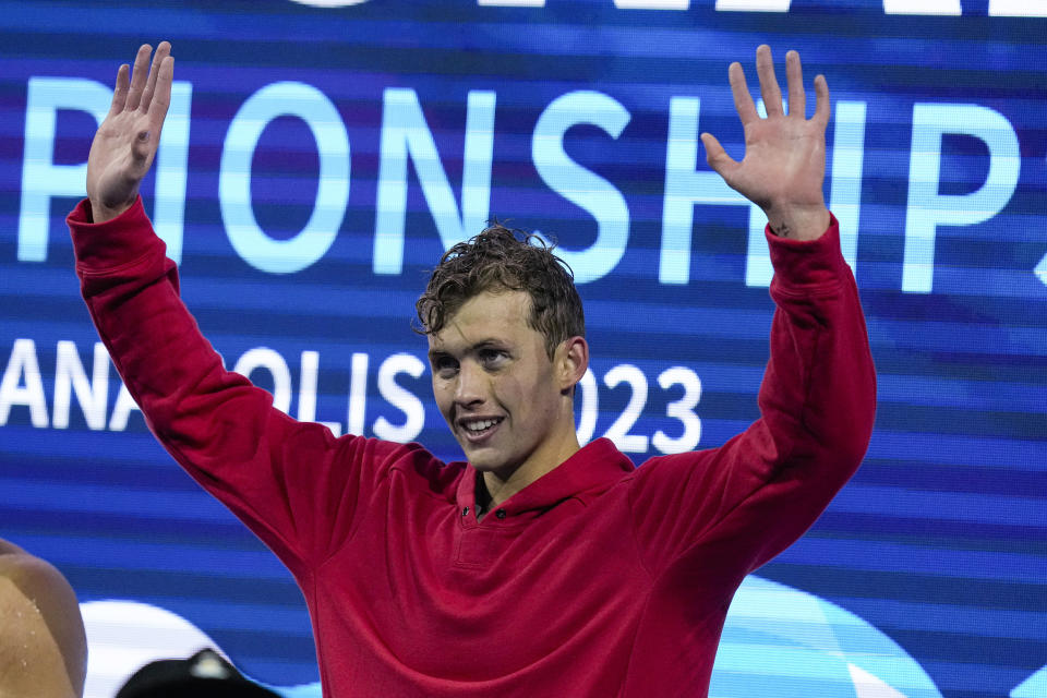 Carson Foster waves from the medals stand after winning the men's 400-meter individual medley at the U.S. nationals swimming meet in Indianapolis, Thursday, June 29, 2023. (AP Photo/Michael Conroy)