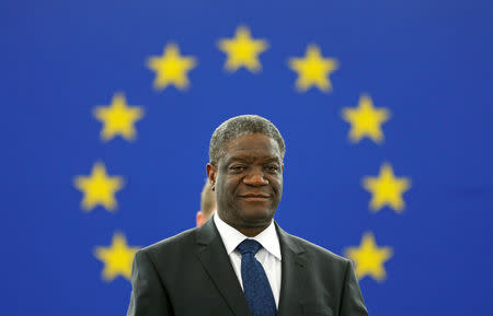 FILE PHOTO: Congolese gynaecologist Denis Mukwege attends an award ceremony to receive his 2014 Sakharov Prize at the European Parliament in Strasbourg November 26, 2014. Mukwege is specialized in the treatment of rape victims and founder of the Panzi Hospital in Bukavu, in the Democratic Republic Congo. REUTERS/Vincent Kessler/File Photo