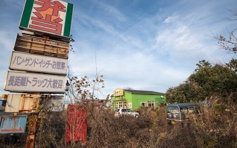 An abandoned lunch box shop in Okuma, Fukushima Prefecture - Credit: Simon Townsley