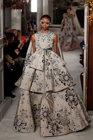 A model presents a creation by Italian designer Pier Paolo Piccioli as part of his Haute Couture Spring-Summer 2019 collection show for fashion house Valentino in Paris, France, January 23, 2019. REUTERS/Benoit Tessier