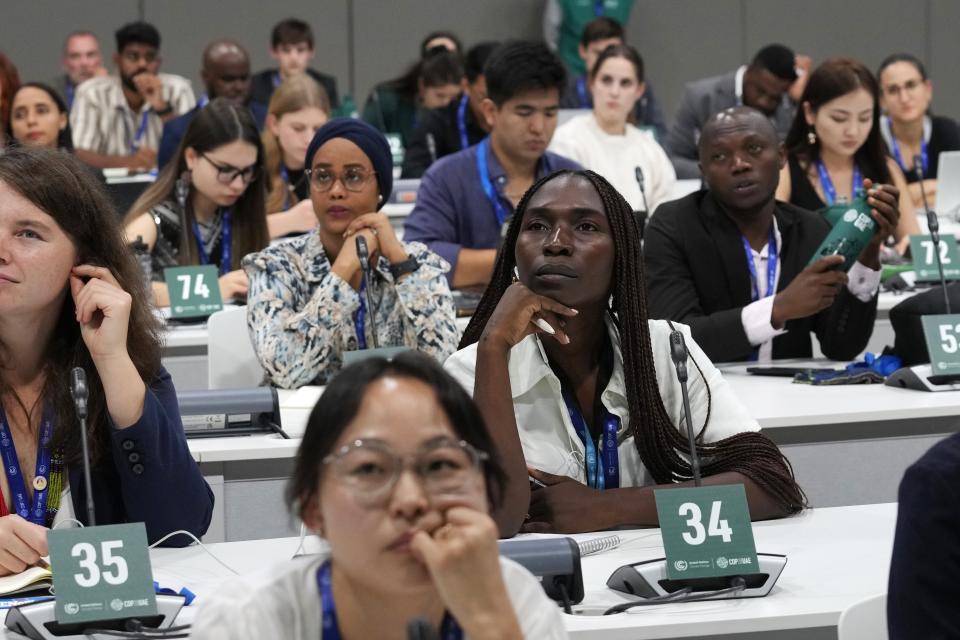 FILE - Claudia Ondo attends a youth session at the COP28 U.N. Climate Summit, Thursday, Nov. 30, 2023, in Dubai, United Arab Emirates. (AP Photo/Rafiq Maqbool, File)