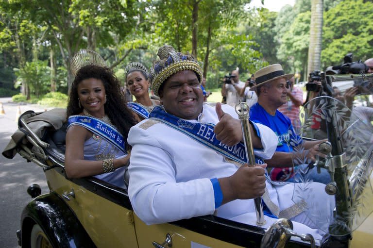 King Momo arrives for the ceremony to receive the key of Rio de Janeiro from Rio's Mayor and thus officially open the city's world famous carnival on February 8, 2013 in the Brazilian beach city. The 150-kilogram Milton Rodrigues da Silva, the event's undisputed king for the past five years in a row, kicked off five days of nonstop partying in Brazil's Marvelous City, Rio