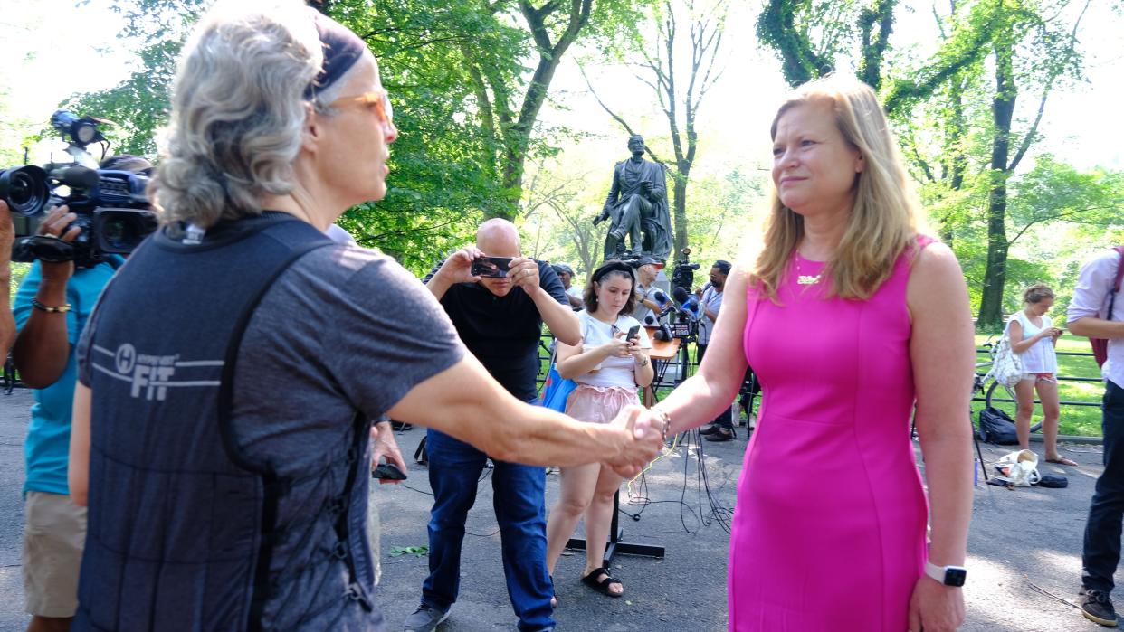 Kathryn Garcia shakes hands with supporters after delivering remarks Wednesday in Central Park. 