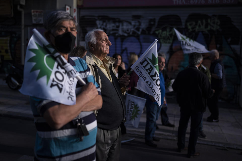 Supporters of PASOK-Movement for Change (KINAL) listen to the leader of the party Nikos Androulakis during a pre election rally, in Athens, on Wednesday, May 17, 2023. Greeks go to the polls Sunday, May 21, in the first general election held since the country ended successive international bailout programs and strict surveillance period imposed by European leaders. Conservative Prime Minister Kyriakos Mitsotakis is seeking a second four-year term and is leading in opinions but may need a coalition partner to form the next government. (AP Photo/Petros Giannakouris)