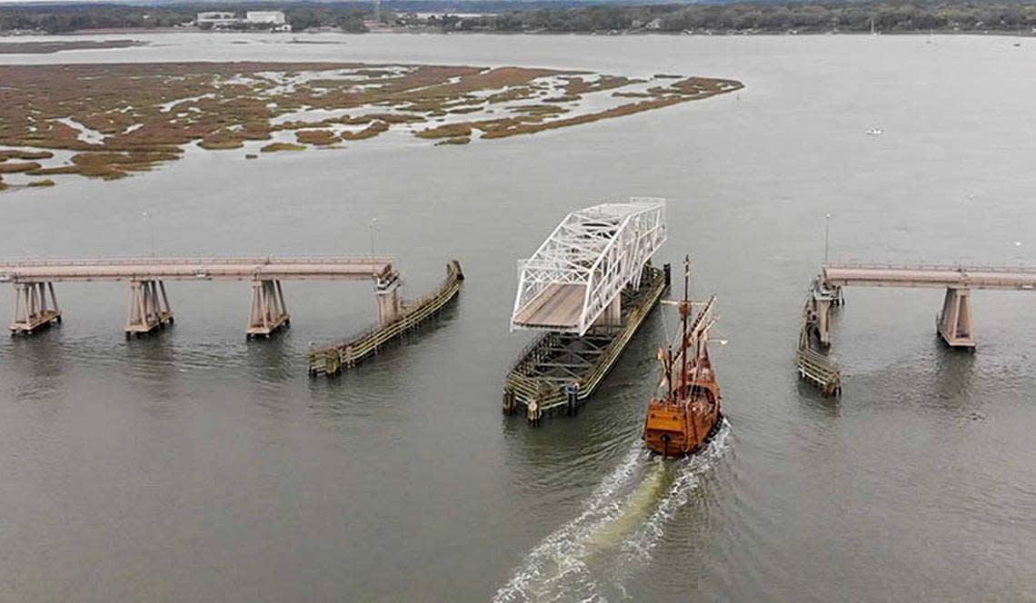 The Richard V. Woods Memorial Bridge, a swing span bridge, opens to allow a vessel to pass. A new opening schedule allow continuous motor vehicle traffic over the bridge during rush our. Shawn Hill photo