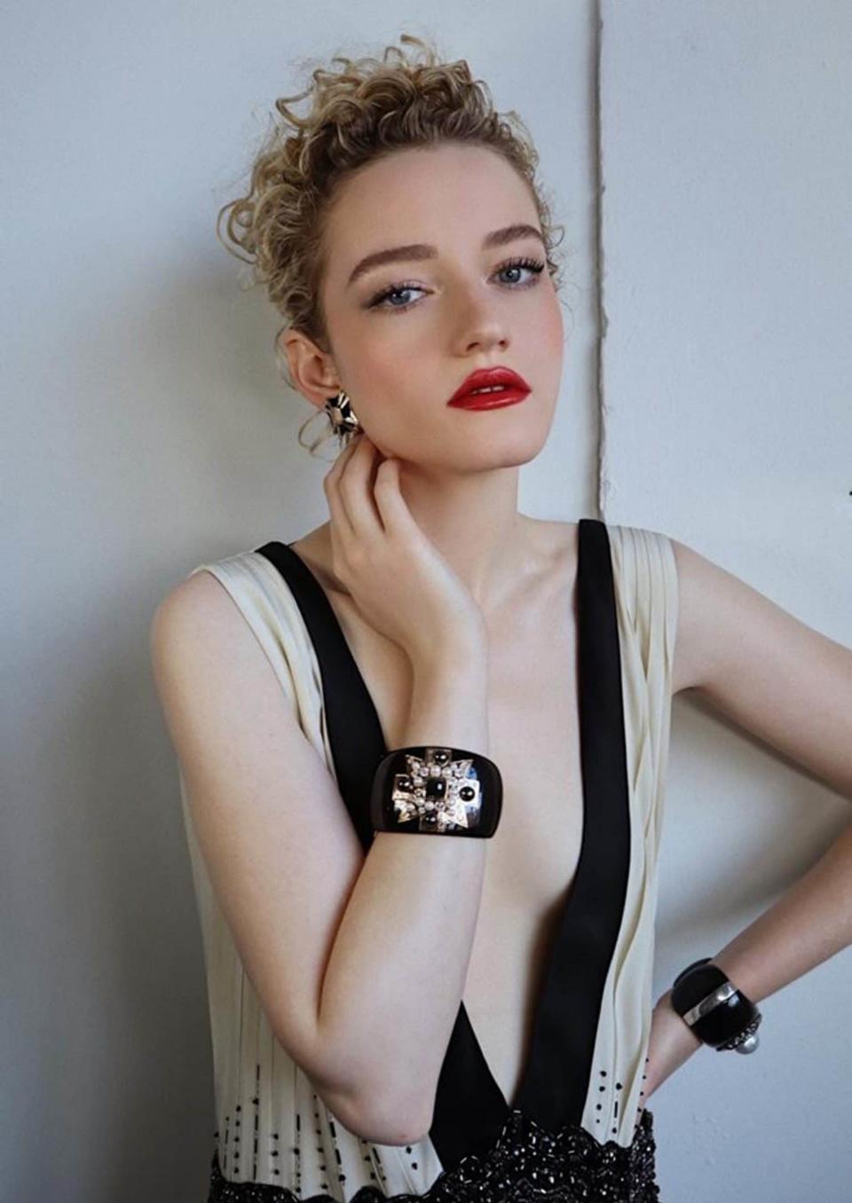 Julia Garner wearing Maltese Cuffs by Verdura and matching earrings -  Hung Vaango via Getty Images