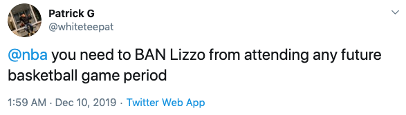 A screenshot of a tweet about Lizzo wearing a black dress that exposed her thong at a basketball game