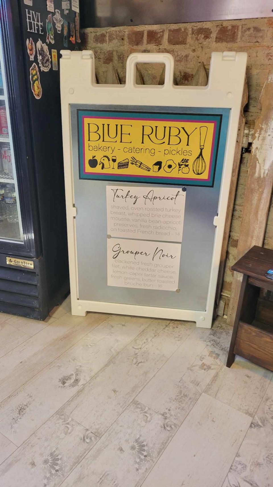 Jesse Roque, the former head chef of Never Blue, has partnered with her husband, Edson, and former Never Blue co-worker Lesley Milhas to open Blue Ruby Bistro and Bakery at Flat Rock Square.