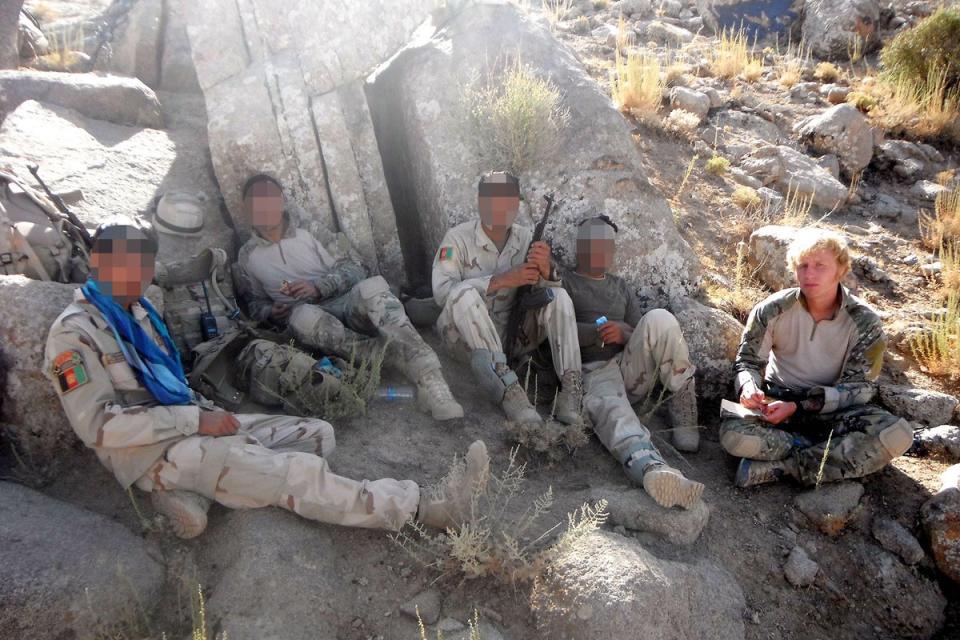 Alex (far right) pictured with colleagues on a reconnaissance mission (Supplied)