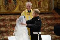 <p>Prince Harry and his best man, the Duke of Cambridge, both wore the frockcoat uniform of the Blues and Royals. (Photo: Getty) </p>