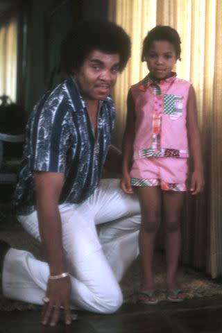 <p>Michael Ochs Archives/Getty</p> Joe Jackson with daughter Janet Jackson in 1972