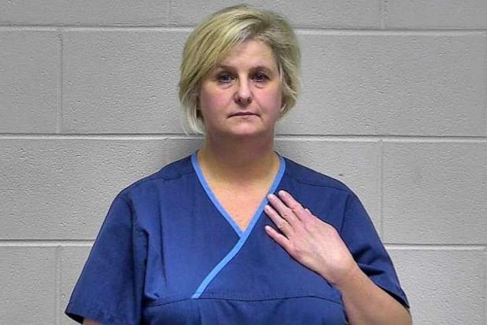 <p>Oldham County Detention Center</p> Stephanie M. Russell, dressed in her scrubs for a mugshot following her May 19, 2022 arrest.