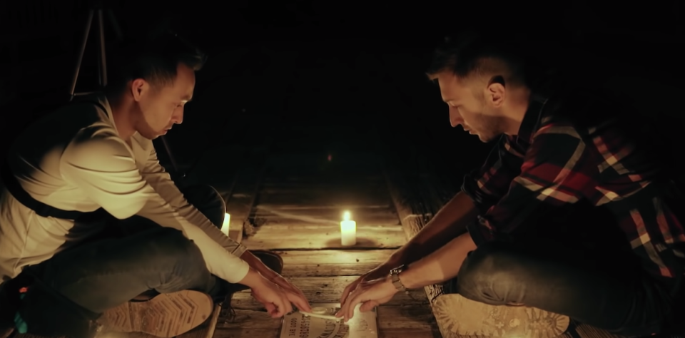 ryan bergara and shane madej using a ouija board