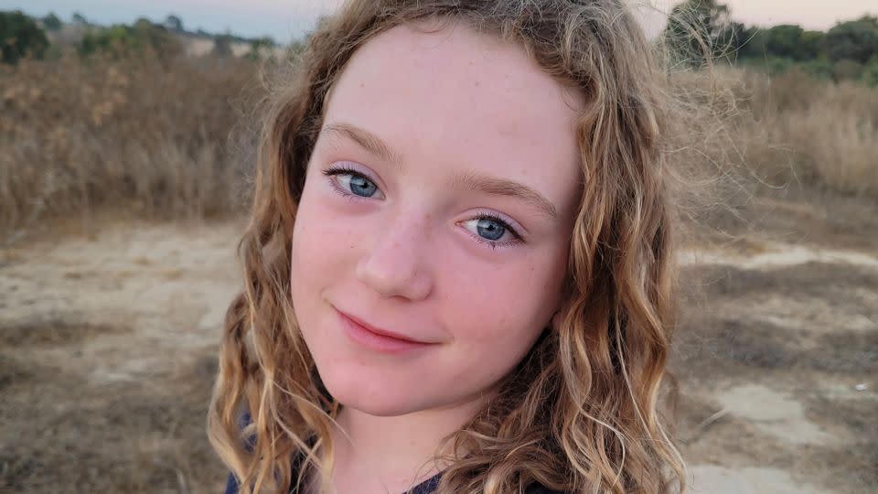 This September 2023 photo shows Emily Hand near Kibbutz Be'eri, Israel. - Yael Shahrur Noah/AP