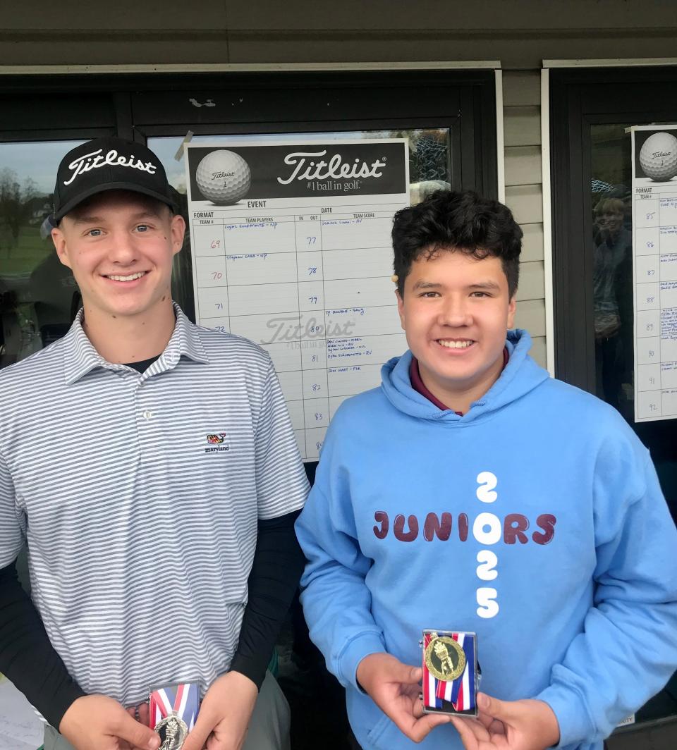 New Paltz teammates Loyal Goodermore, right, and Stephen Carr pose after finishing first and second, respectively, in the MHAL boys golf tournament on Oct. 18, 2023.
