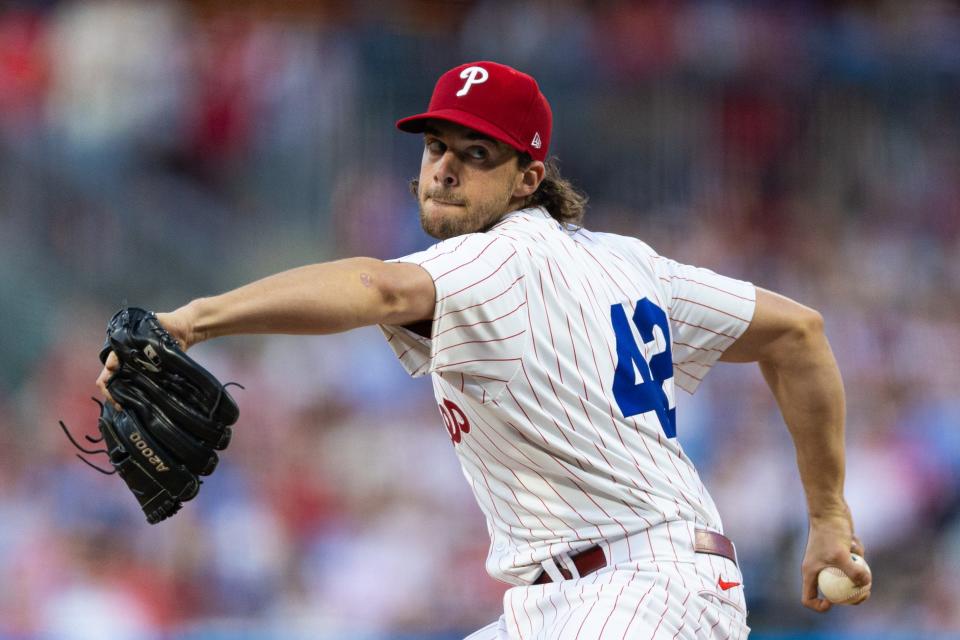 Philadelphia Phillies pitcher Aaron Nola (42) throws a pitch during the third inning against the Colorado Rockies Monday, April 15, 2024, at Citizens Bank Park in Philadelphia.