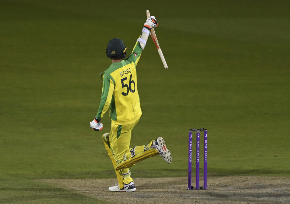 Australia's Mitchell Starc celebrates their win in the third ODI cricket match between England and Australia, at Old Trafford in Manchester, England, Wednesday, Sept. 16, 2020. (Shaun Botterill/Pool via AP)