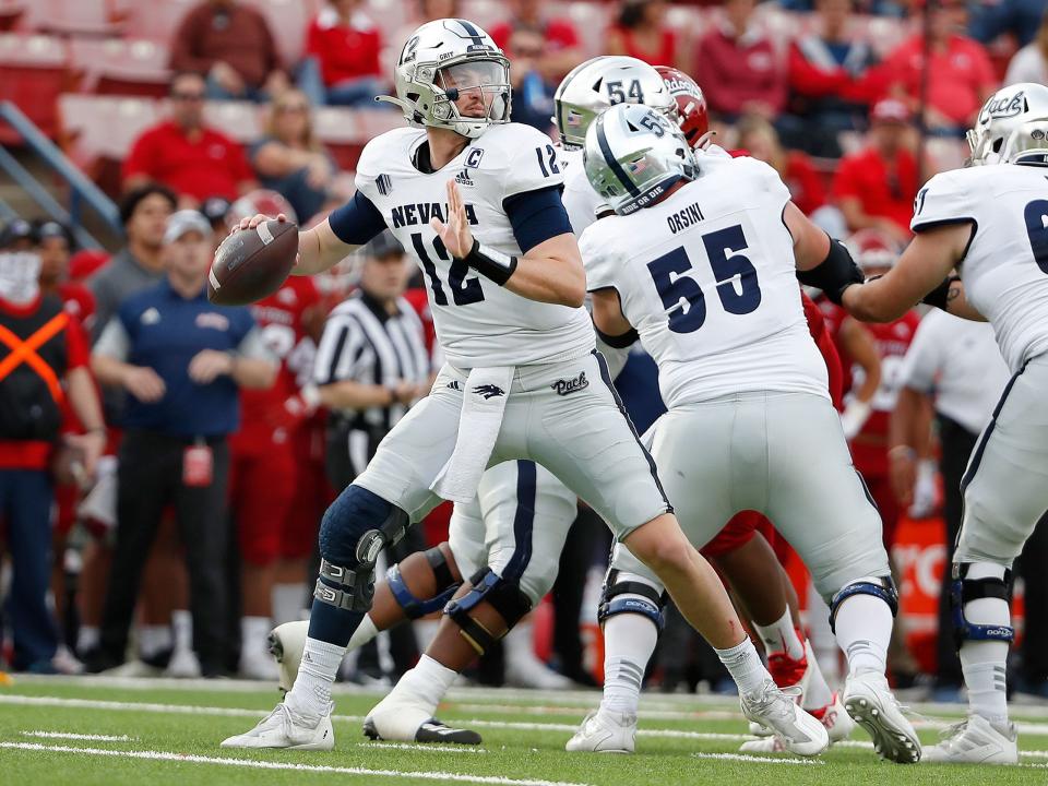 Carson Strong makes a pass against Fresno State.