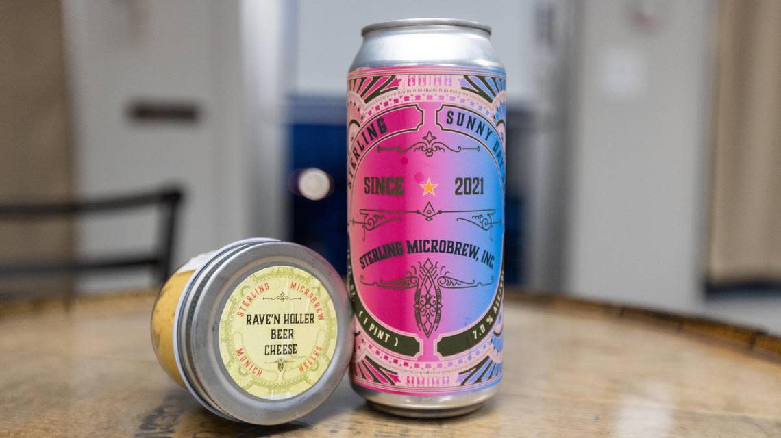A jar of Rave’n Holler beer cheese, left, and a 1 pint can of Sunny Day Sour, right, from Sterling MicroBrew in Mt. Sterling. January 25, 2024. Marcus Dorsey/mdorsey@herald-leader.com