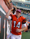 CINCINNATI, OH - OCTOBER 16: Andy Dalton #14 of the Cincinnati Bengals celebrates with fans following the NFL game against the Indianapolis Colts at Paul Brown Stadium on October 16, 2011 in Cincinnati, Ohio. The Bengals won 27-17. (Photo by Andy Lyons/Getty Images)