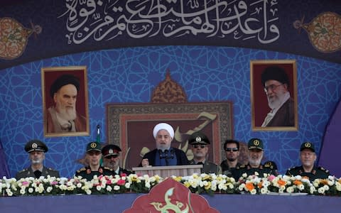 Iranian President Hassan Rouhani delivers a speech during the ceremony of the National Army Day parade in Tehran - Credit: Wana News Agency&nbsp;