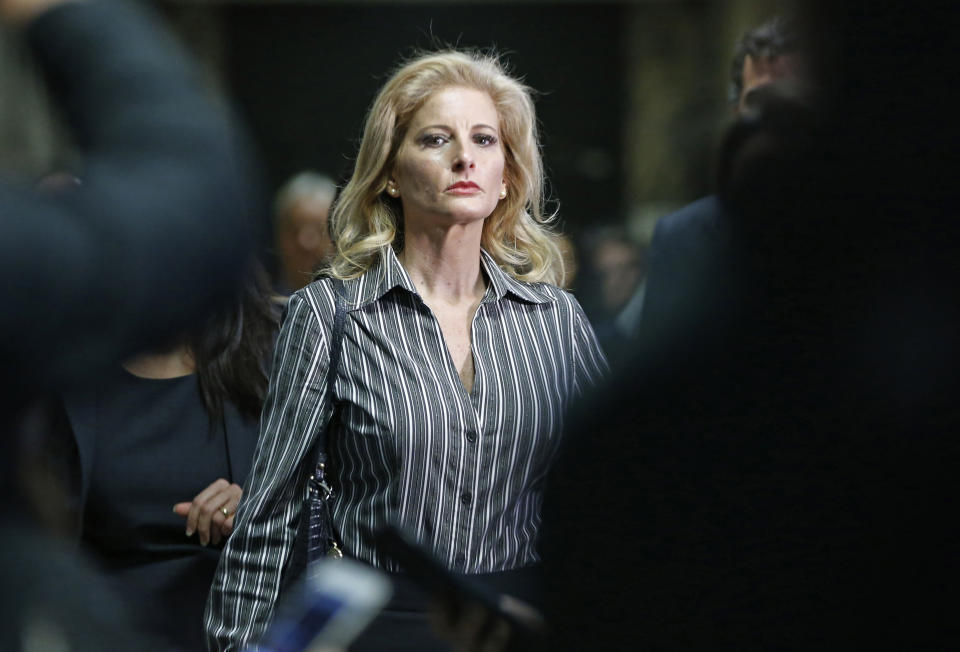 FILE - In this Dec. 5, 2017, file photo, Summer Zervos leaves Manhattan Supreme Court at the conclusion of a hearing in New York. The former "Apprentice" contestant is trying to get her defamation lawsuit against former President Donald Trump moving again now that he's no longer president. (AP Photo/Kathy Willens, File)