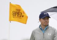 Jordan Spieth of the U.S. walks off the fifth green after making his birdie putt during the final round of the British Open golf championship on the Old Course in St. Andrews, Scotland, July 20, 2015. REUTERS/Russell Cheyne