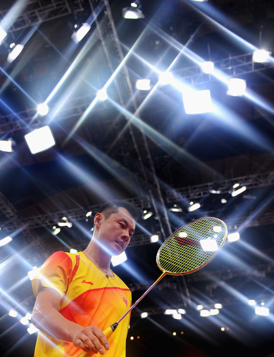 Chen Xu of China looks on against Peng Soon Chan and Liu Ying Gohon of Malaysia during their Mixed Doubles Badminton on Day 2 of the London 2012 Olympic Games at Wembley Arena on July 29, 2012 in London, England. (Photo by Michael Regan/Getty Images)