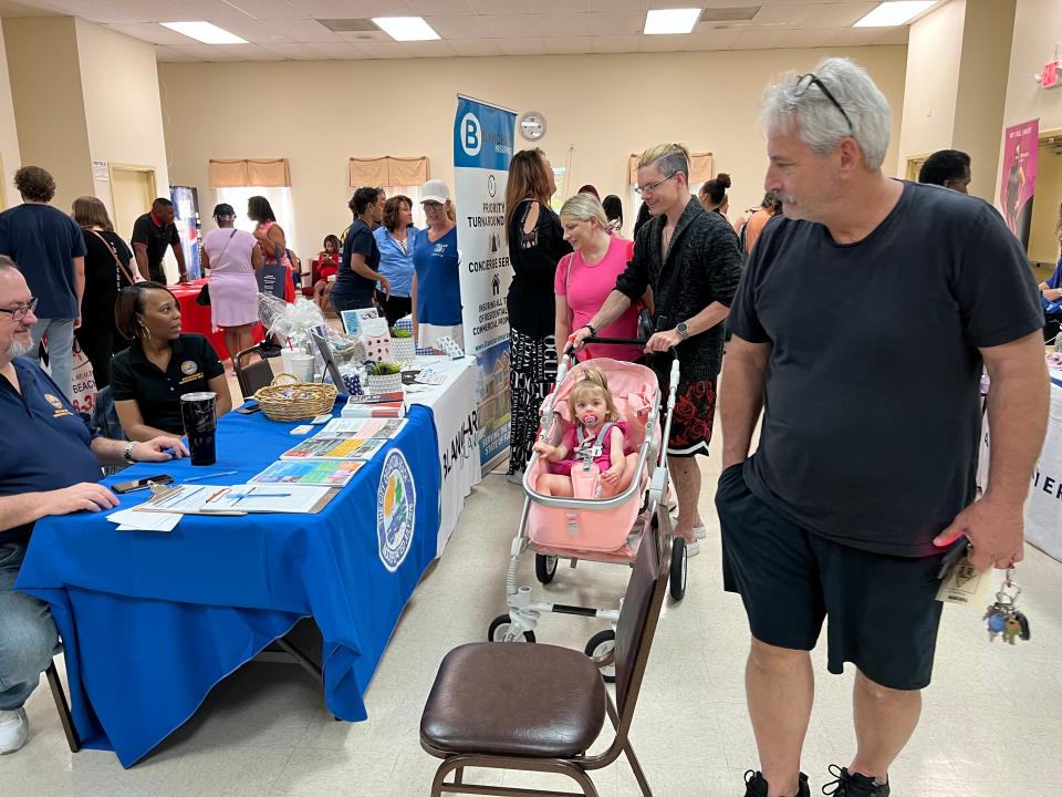 People check out the various information tables at last year's Housing Fair & Financial Clinic at Allen Chapel AME Church in Daytona Beach on April 29, 2023. The free event aimed at first-time homebuyers and those in need of financial, legal, insurance and health care services, will be held again this year from 10 a.m. to 2 p.m. at the same location on Saturday, April 29, 2024.