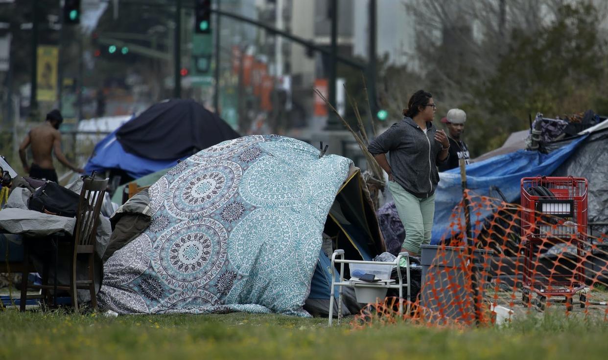 <span class="caption">American citizens, even homeless ones, still have the right to vote.</span> <span class="attribution"><a class="link " href="https://newsroom.ap.org/detail/VirusOutbreakCaliforniaHomeless/eaa27ff159b04699b6e0eeec105b5c3b/photo" rel="nofollow noopener" target="_blank" data-ylk="slk:AP Photo/Ben Margot;elm:context_link;itc:0;sec:content-canvas">AP Photo/Ben Margot</a></span>