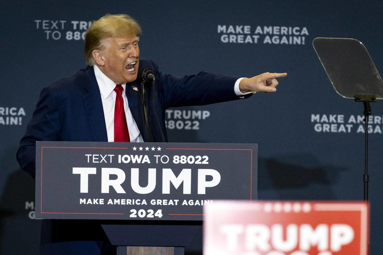 Former US President and Republican presidential hopeful Donald Trump speaks during a "Commit to Caucus" rally at the North Iowa Events Center in Mason City, Iowa, on January 5, 2024. (Photo by Christian MONTERROSA / AFP)