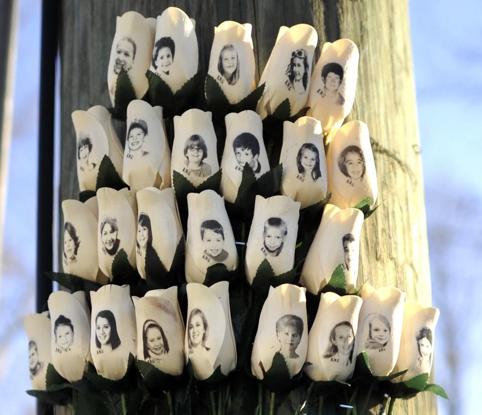 Roses with the faces of the 2012 Sandy Hook Elementary School victims in Newtown, Connecticut.