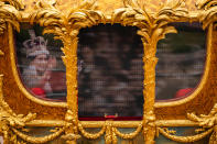 <p>A hologram of the Queen during her coronation was projected in the Gold State Coach during the Platinum Jubilee Pageant in front of Buckingham Palace on the final day of celebrations. (PA)</p> 