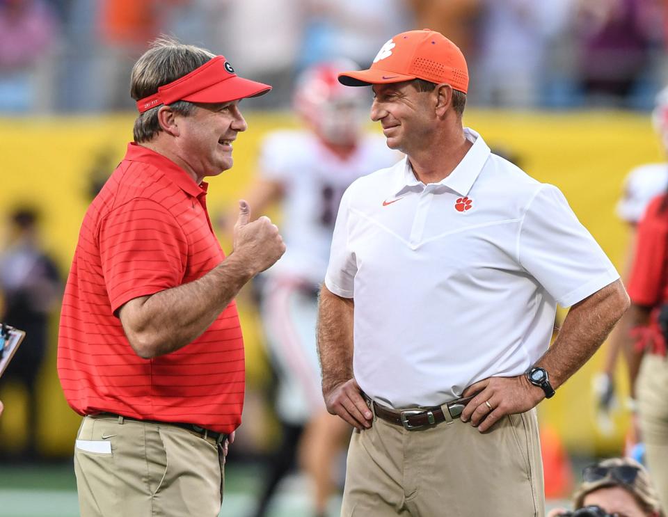 Georgia Head Football Coach Kirby Smart and  Clemson head coach Dabo Swinney talk during pregame warm ups Sep 4, 2021; Charlotte, North Carolina, USA;  at Bank of America Stadium. (Ken Ruinard-USA TODAY Sports)