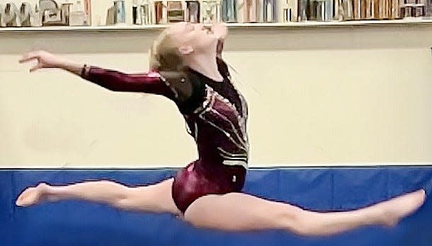 Nicole Lickliter displays part of her gymnastics style.