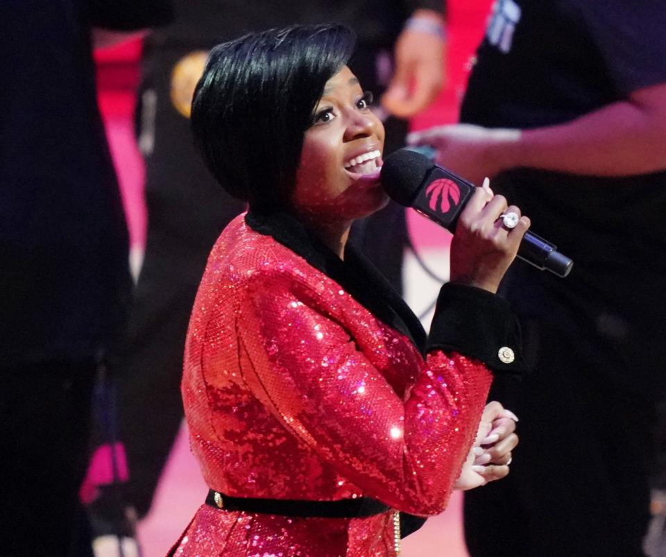 Singer and songwriter Fantasia Barrino sings the American national anthem before game two of the 2019 NBA Finals between the Golden State Warriors and the Toronto Raptors at Scotiabank Arena.