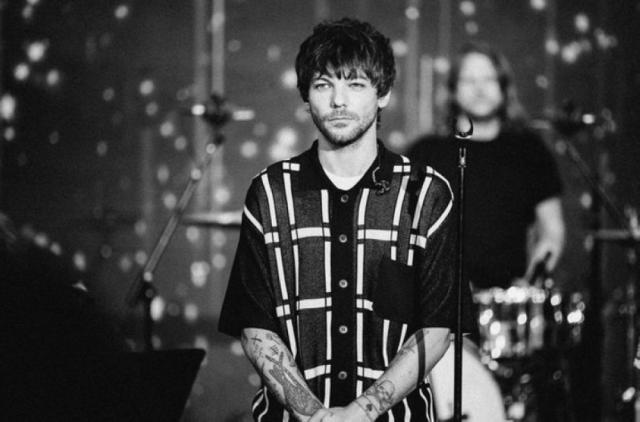 Louis Tomlinson of One Direction performing in concert at St James Theatre  Wellington New Zealand - 22.04.12 Stock Photo - Alamy