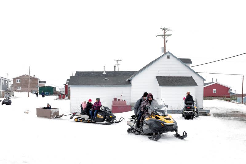 The Wider Image: Climate change means the Inuit do what they've always done: Adapt