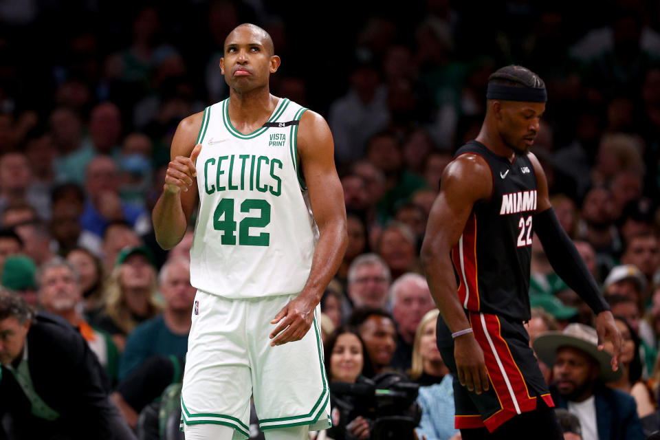 Al Horford reacts in front of Jimmy Butler during Game Four of the 2022 NBA Playoffs Eastern Conference Finals. (Photo by Elsa/Getty Images)