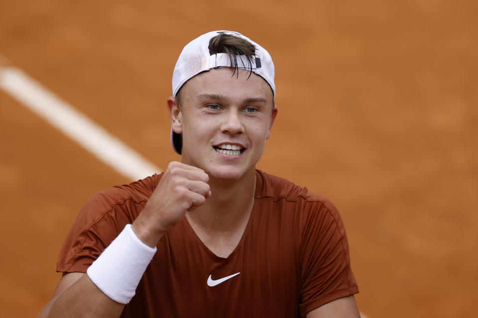 Holger Rune celebrates his win.