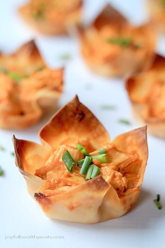 <p>Julie's Eats and Treats</p><p>The classic spicy chicken dip packed inside a crispy wonton wrapper!</p><p><strong>Get the recipe: <a href="http://www.julieseatsandtreats.com/skinny-buffalo-chicken-wonton-cups/" rel="nofollow noopener" target="_blank" data-ylk="slk:Skinny Buffalo Chicken Wonton Cups;elm:context_link;itc:0;sec:content-canvas" class="link ">Skinny Buffalo Chicken Wonton Cups</a></strong></p>