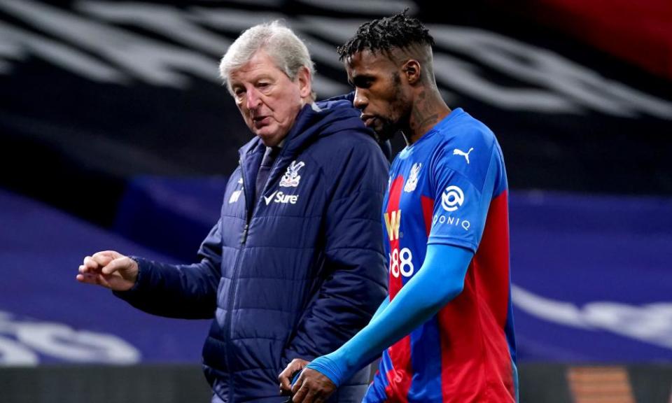 Roy Hodgson, left, speaks to Wilfried Zaha during their first spell together at Crystal Palace