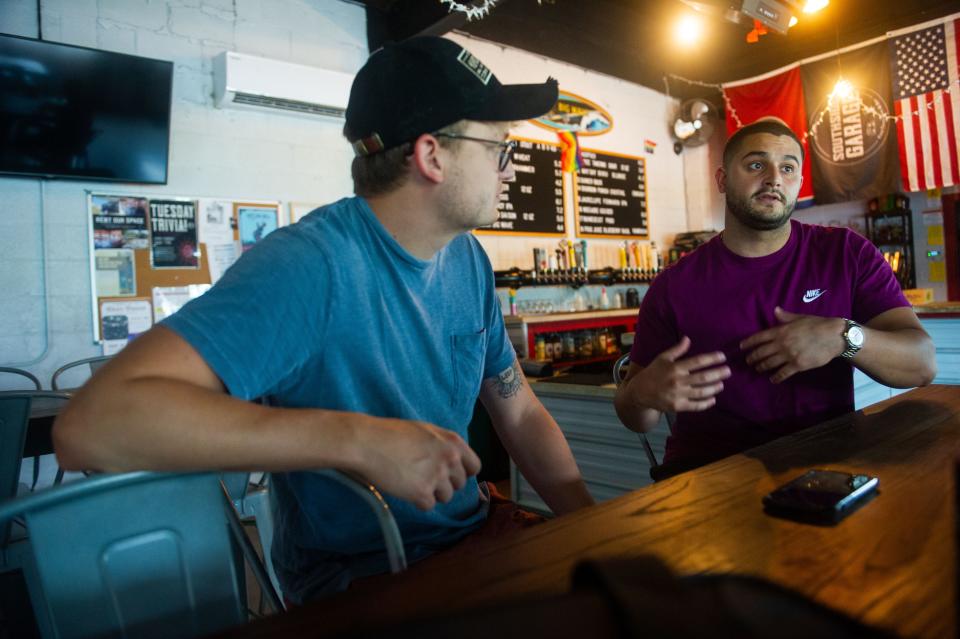 Undeclared co-owners James Tourville and David Yousif speak with Knox News reporter Keenan Thomas off-camera during an interview at SouthSide Garage on Sevier Avenue.