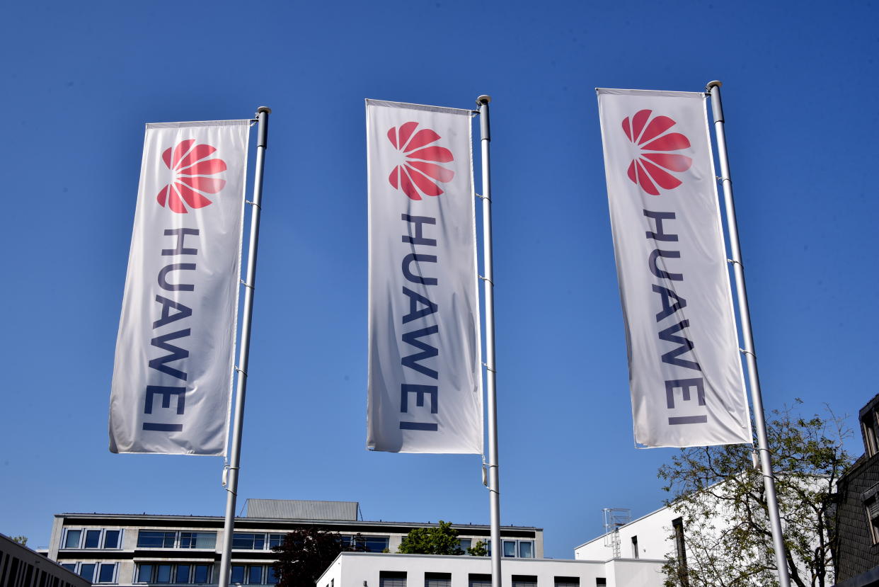 26 April 2020, North Rhine-Westphalia, Bonn: Flags with the logo, lettering of the Chinese telecommunications company HUAWEI blowing in the wind Photo: Horst Galuschka/dpa/Horst Galuschka dpa (Photo by Horst Galuschka/picture alliance via Getty Images)