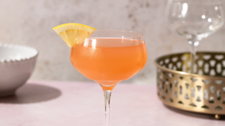 French blonde cocktail with grapefruit garnish